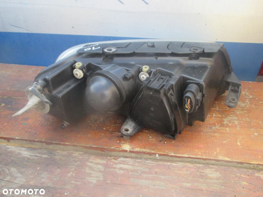 Lampa lewa VW PASSAT B5 LIFT HELLA EUROPA - 5