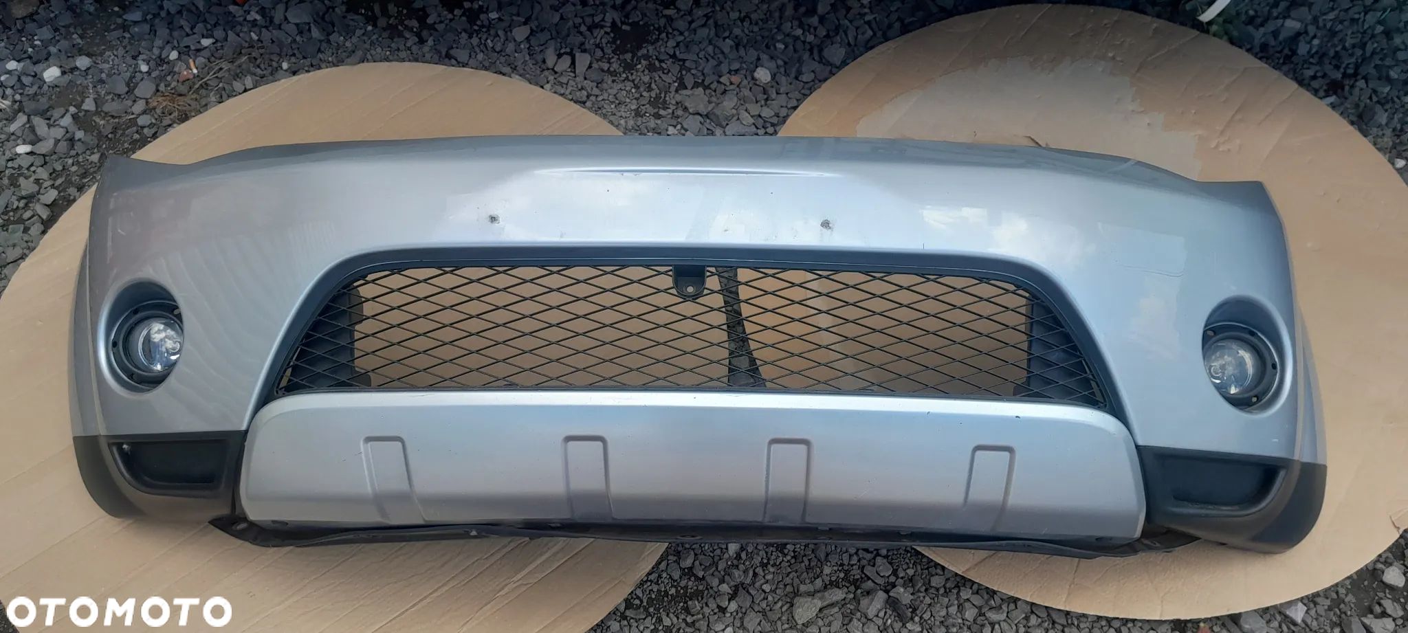 MITSUBISHI OUTLANDER II ZDERZAK PRZEDNI A31 - 1