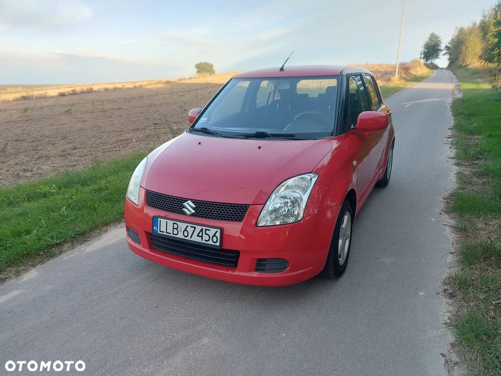 Suzuki Swift 1.3 Club - 4
