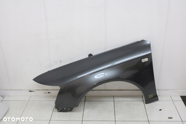 BŁOTNIK LEWY PRZÓD PRZEDNI AUDI A6 C6 2004R- LZ7S - KOD LAKIERU
