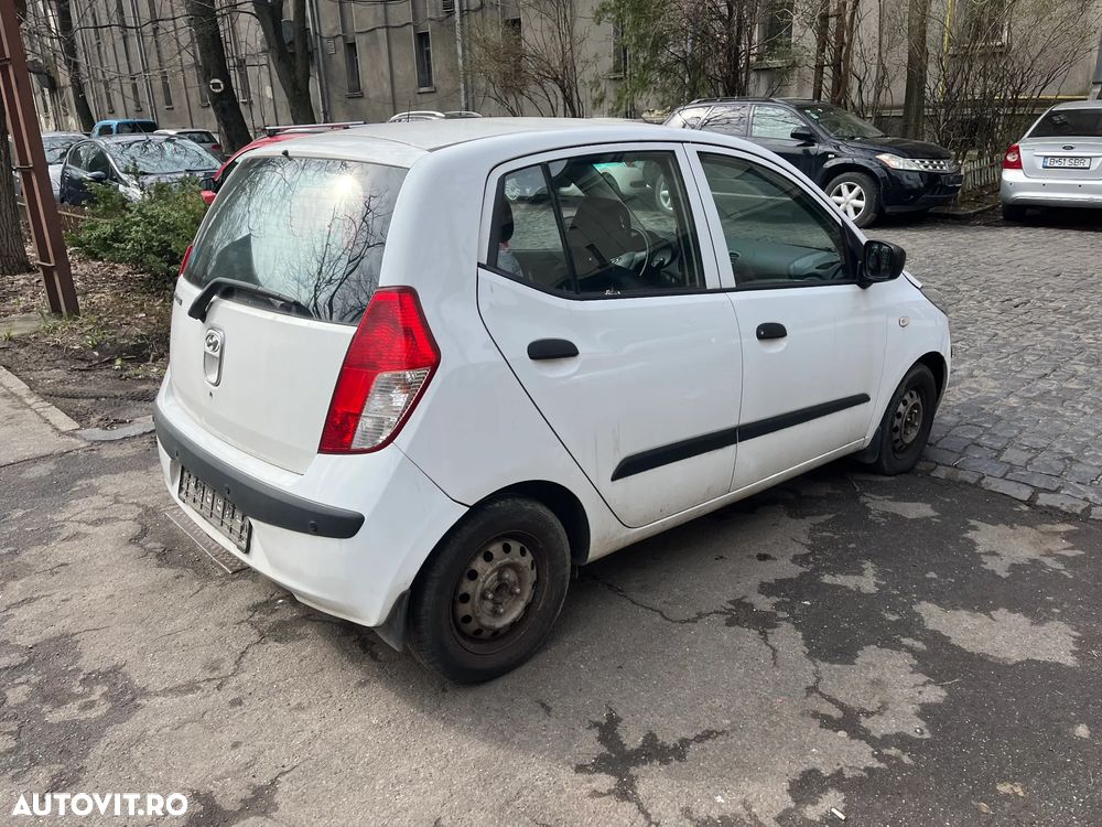 Dezmembrez Hyundai I10 alb 2008 1,1 benzina 48,5KW - 12