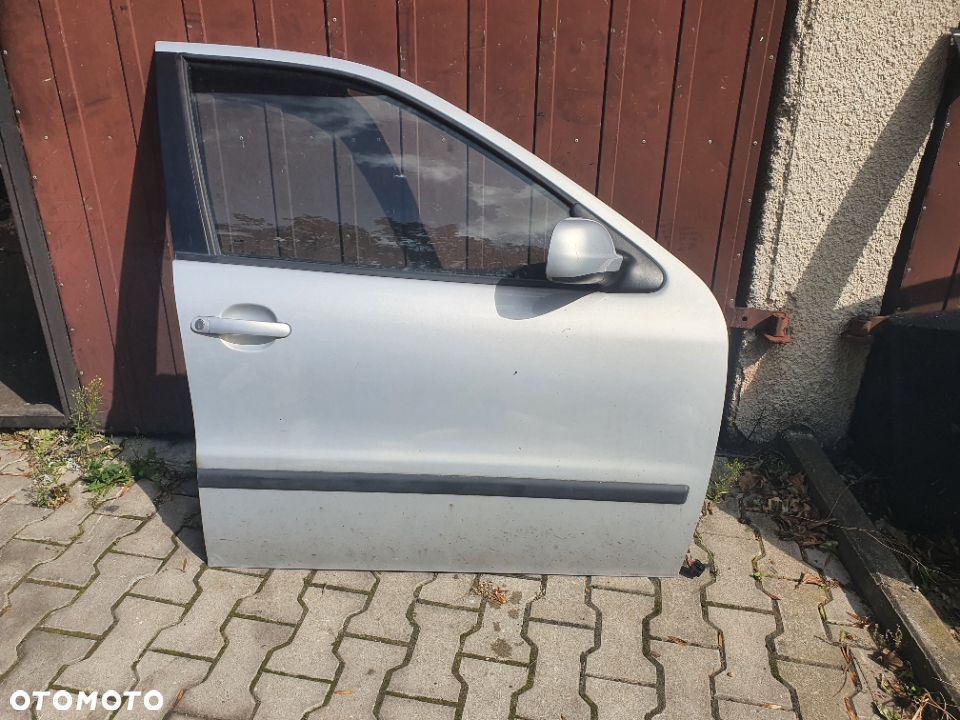 drzwi przód toledo II LEON I  LB7Z prawe