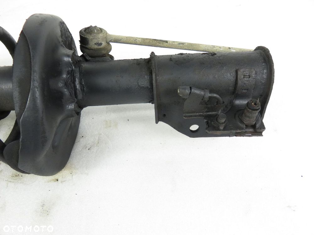 MCPERSON PRAWY PRZEDNI MAZDA 323 F VI BJ 1.5 - 4