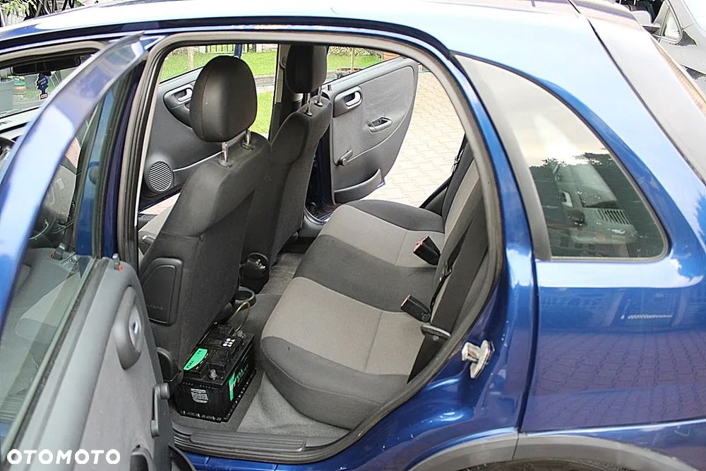 Opel Corsa 1.2 16V Cosmo - 13