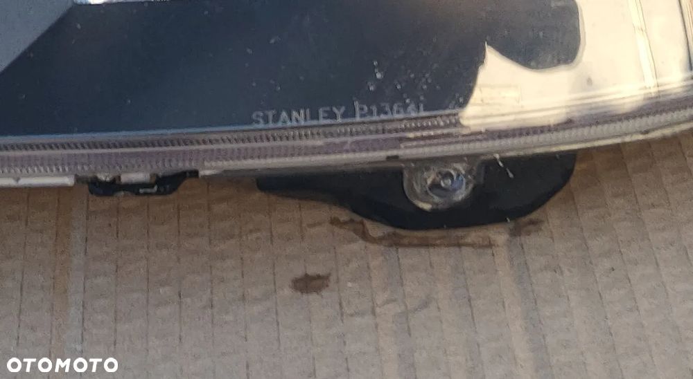 Reflektor lewy Lampa lewa Mazda 323F 2001- Czarna EU - 2