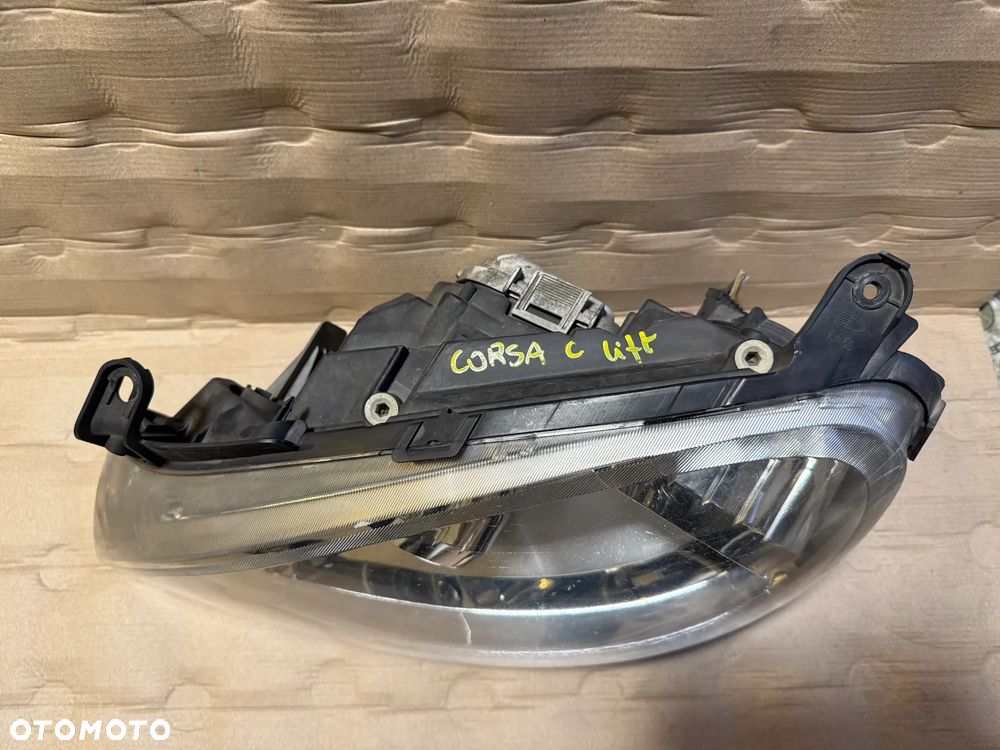 Lampa Opel Corsa C lift 13100536 prawa 13100535 lewa OE - 2