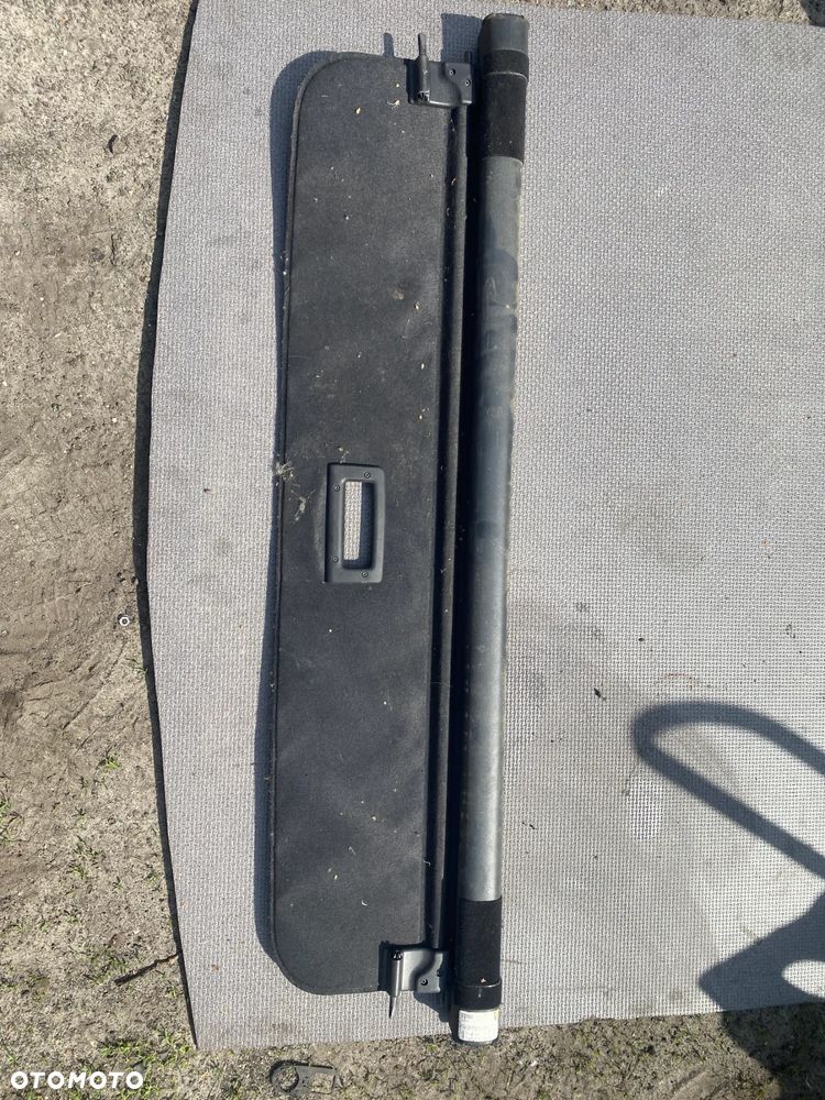 ROLETA ROLETKA BAGAŻNIKA RENAULT LAGUNA III 3 KOMBI