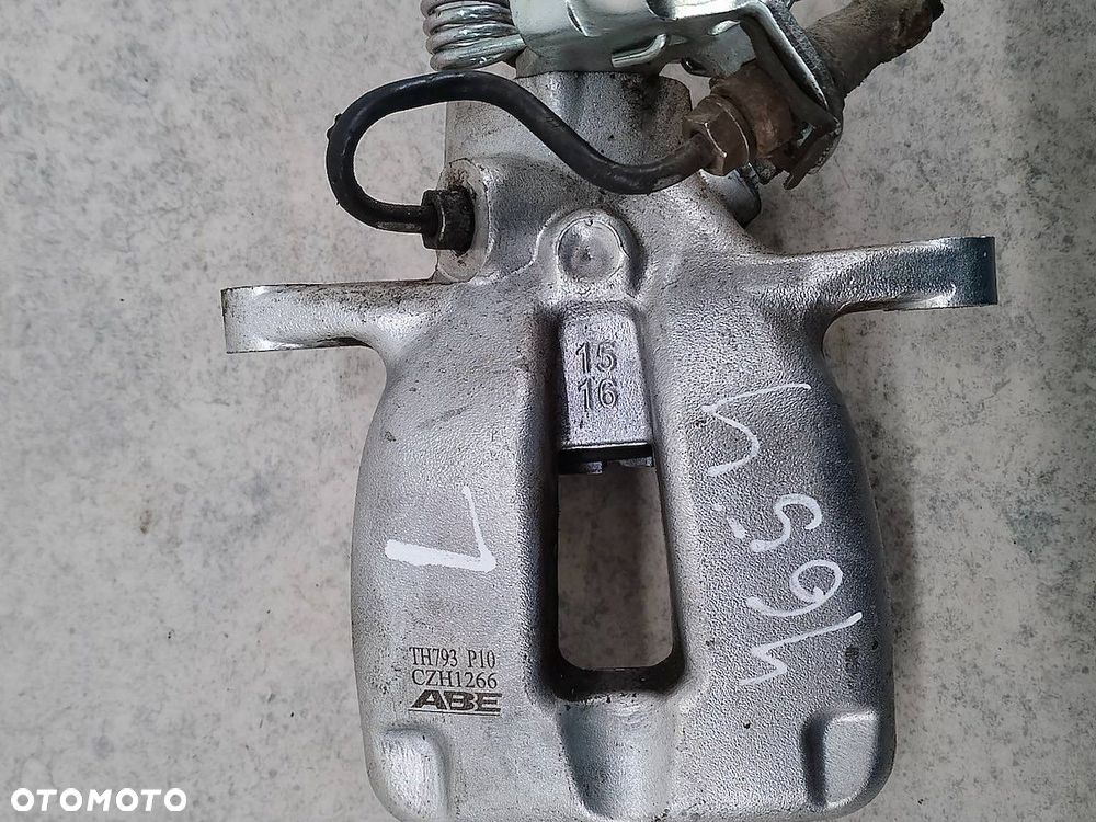 ZACISK HAMULCOWY LEWY TYŁ VW GOLF V TH793 CZH1266 ABE 1.4 TSI - 1