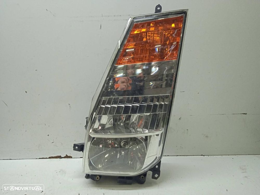 FAROL ESQUERDO NISSAN CABSTAR - 1