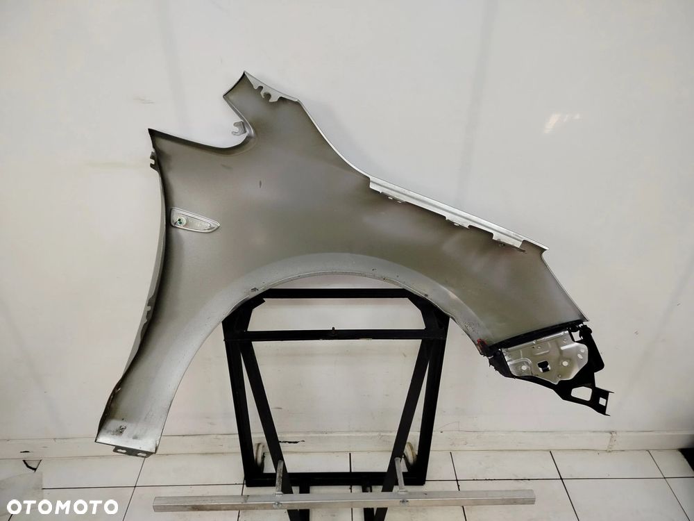 OPEL ASTRA J 09R- BŁOTNIK LEWY PRZÓD PRZEDNI Z176 - 13