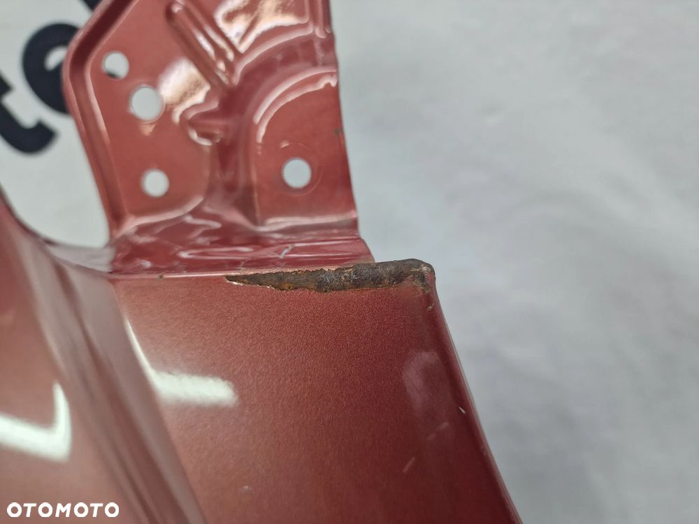 DAIHATSU SIRION II 05- PRAWY BŁOTNIK PRZEDNI PRZÓD , RÓŻOWY , NR AUKCJI BŁ88 - 5