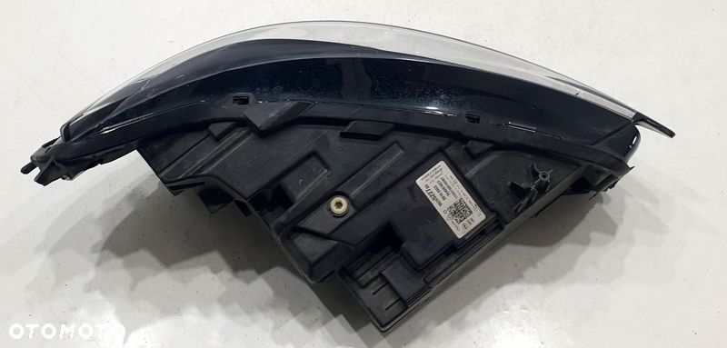 Opel Corsa Reflektor Lewy 9829522780 - 2