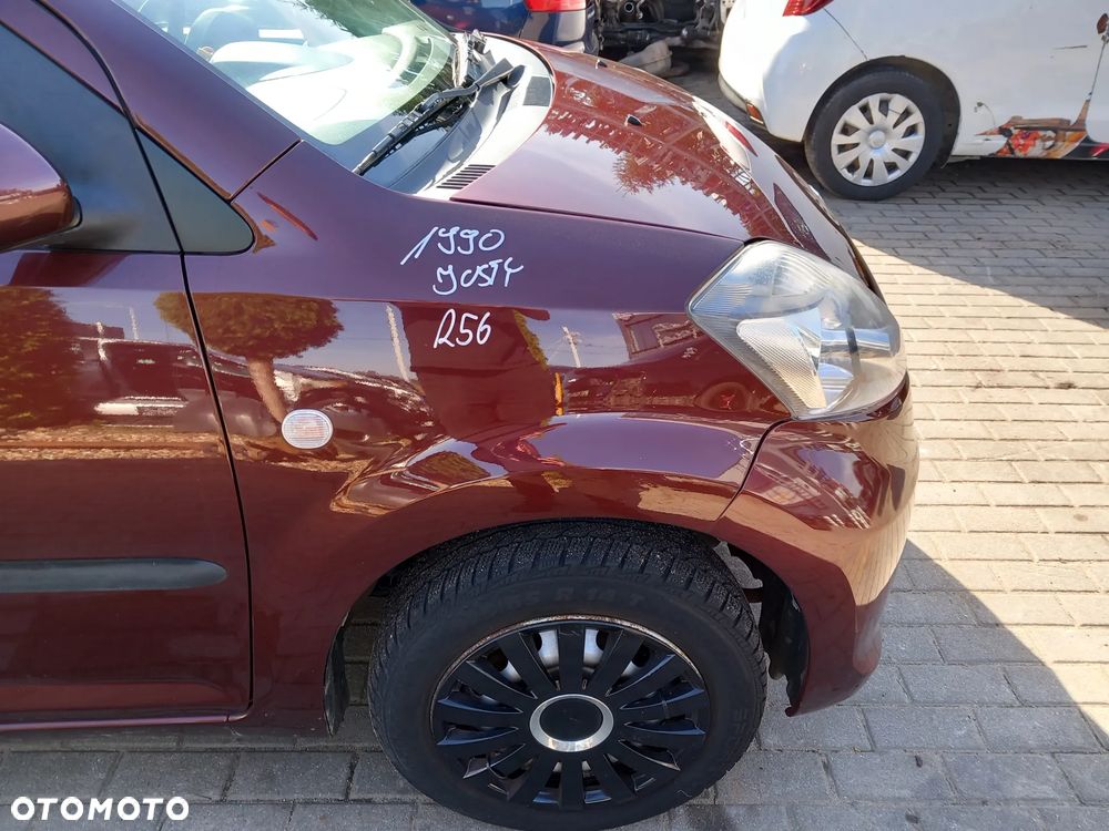 SUBARU JUSTY BŁOTNIK PRAWY PRZEDNI PRAWY PRZÓD KOLOR: R56