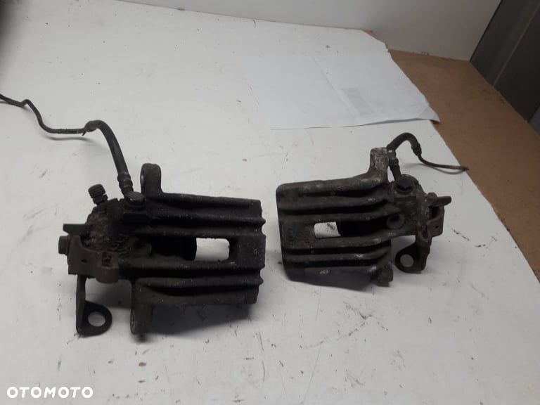 Zacisk tylny lewy Golf IV audi A 3 Skoda Polo Seat - 1