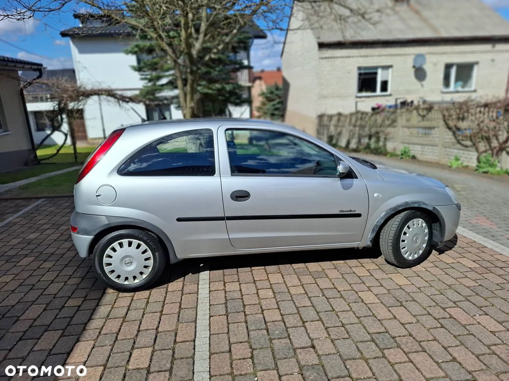 Opel Corsa 1.2 16V Comfort Easytronic - 4