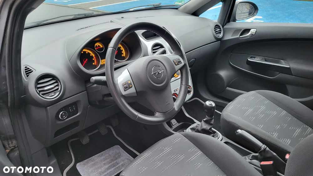 Opel Corsa 1.4 16V Enjoy - 11
