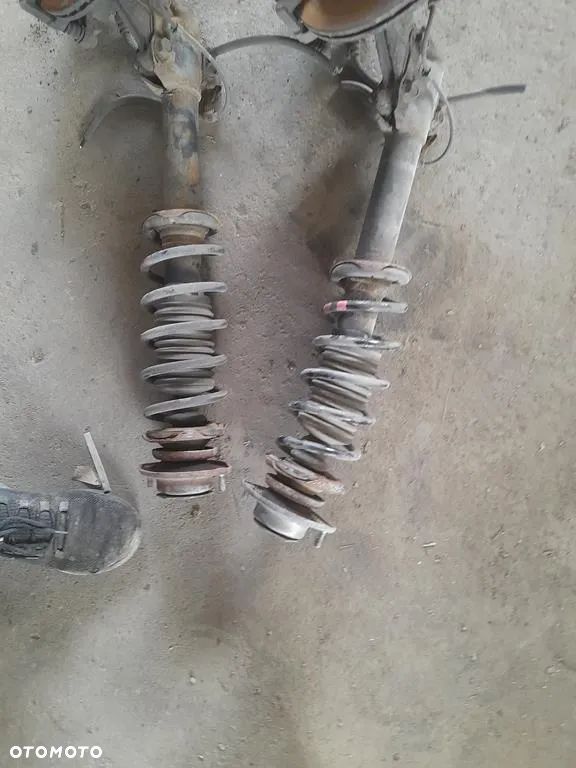 Amortyzator zwrotnica Macpherson Lewy prawy przod Justy IV 4 Sirion II 1.0b - 3