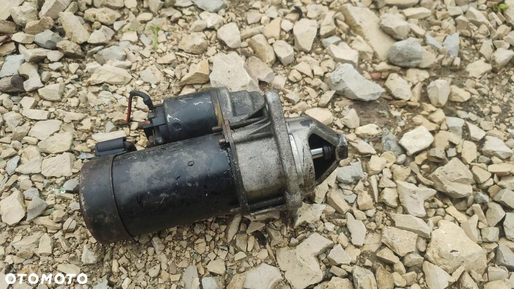 ROZRUSZNIK OPEL CORSA C 1.4 1.6 09130838 - 1