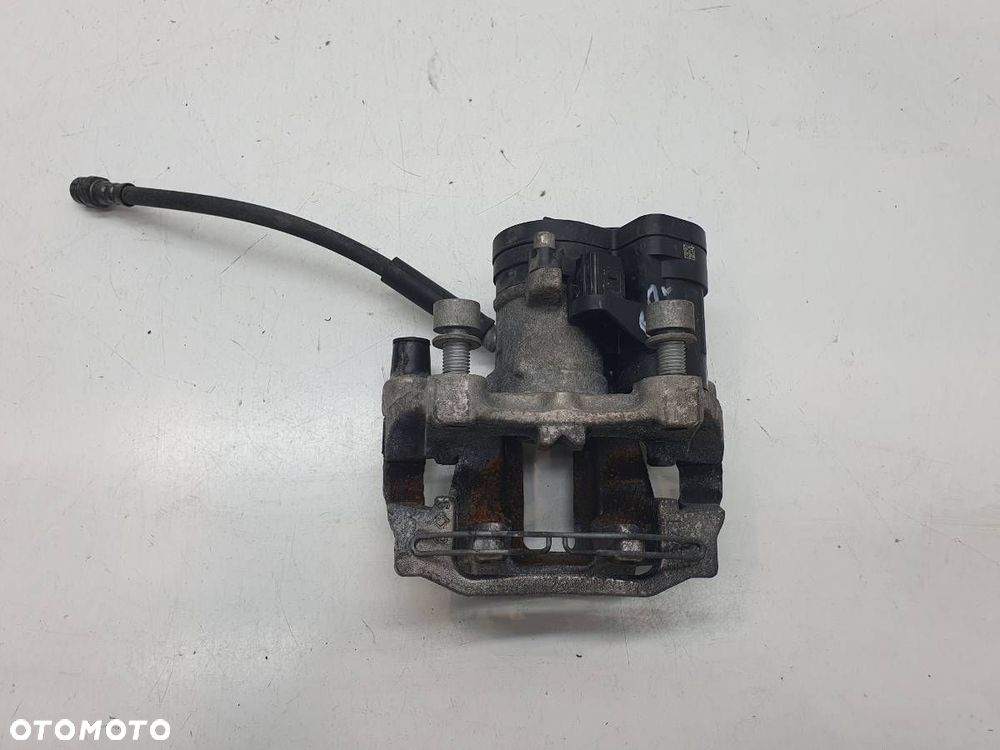 ZACISK HAMULCOWY TYŁ TYLNY PRAWY JARZMO SKODA OCTAVIA IV LIFT 2.0 TDI - 3