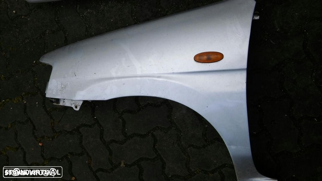 Guarda lamas condutor mazda demio - 2