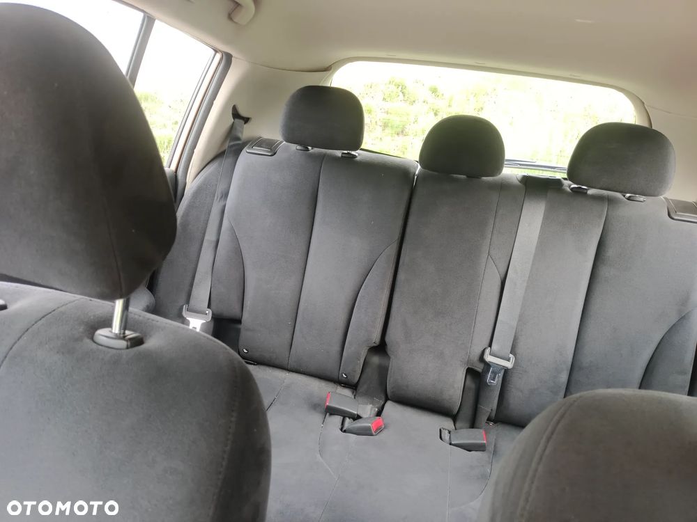 Nissan Tiida 1.6 Tekna - 8