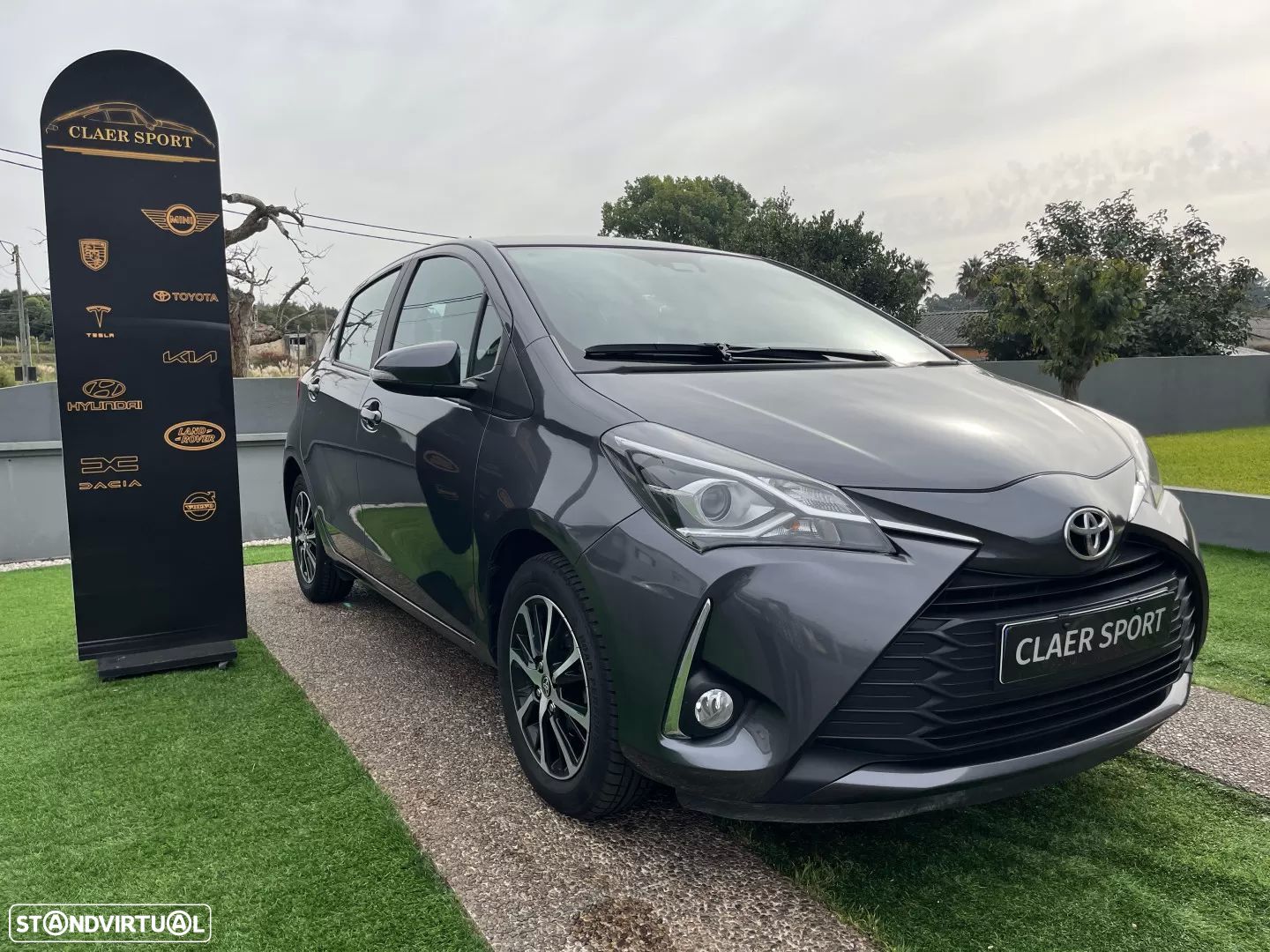 Toyota Yaris 1.0 VVT-i Exclusive - 1