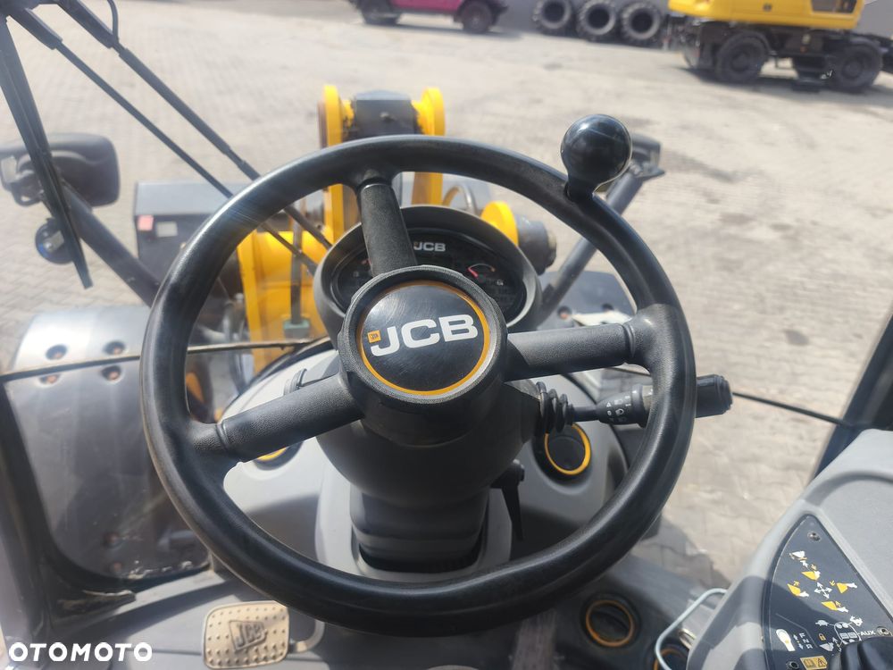 JCB 409 - 12