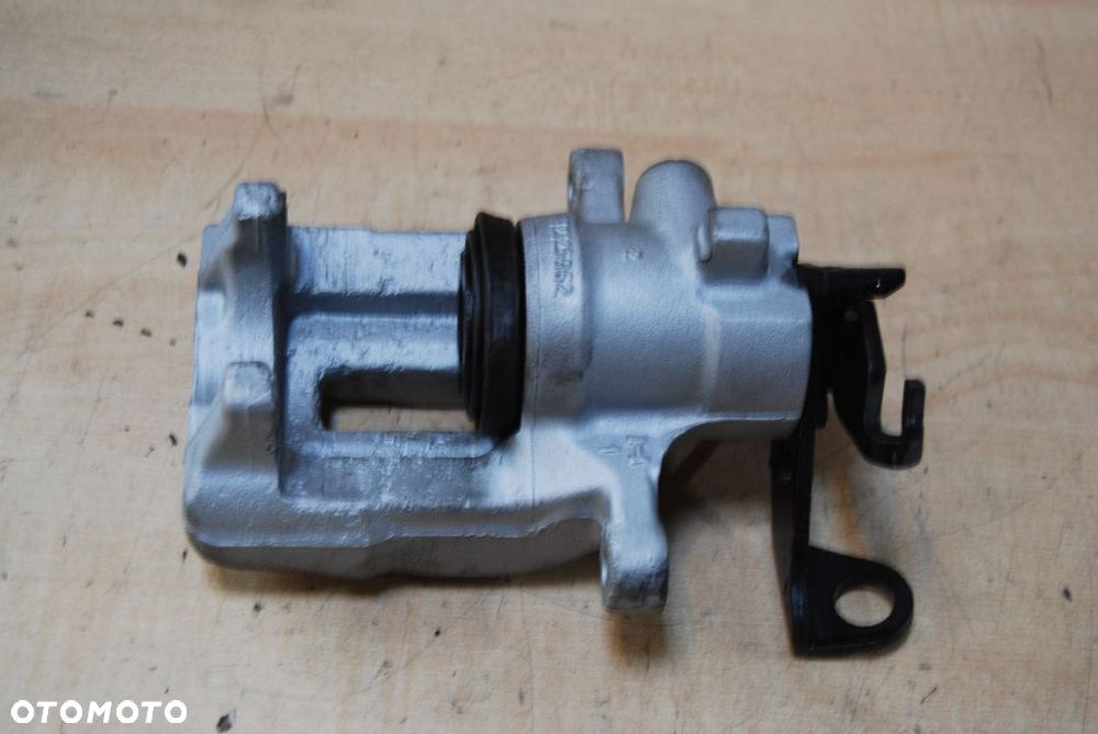 ZACISK LEWY TYŁ LUCAS 32325962 SEAT LEON I AUDI A3 REGENROWANY - 4