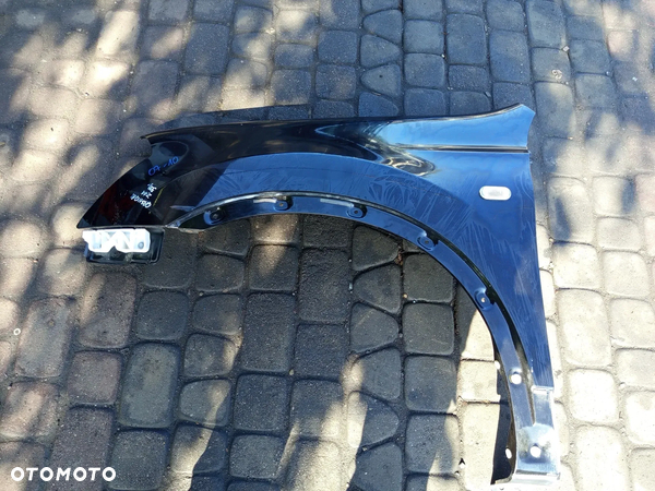 BŁOTNIK NISSAN QASHQAI 07-10 LEWY KOD KOLORU Z11