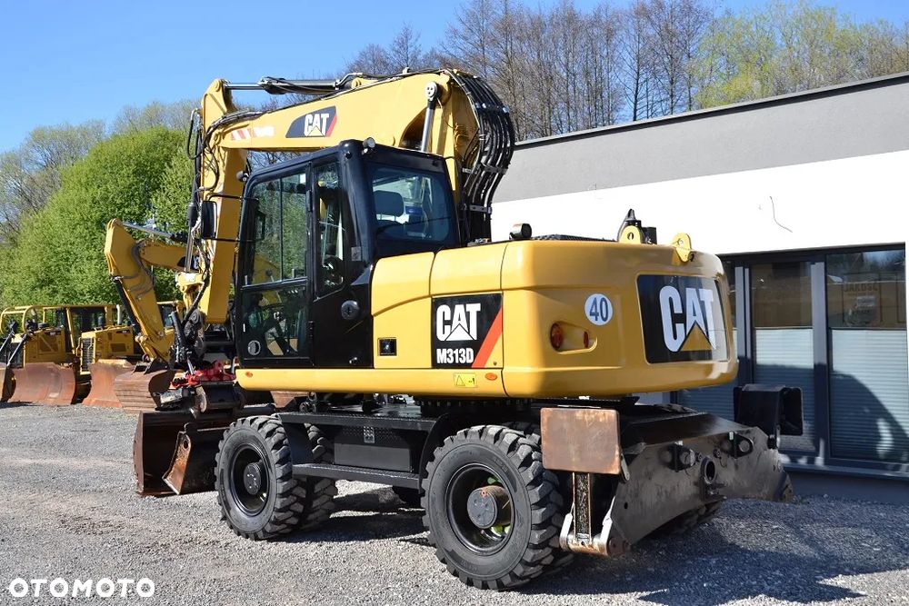 Caterpillar M 313 D, ROTOTILT - 6