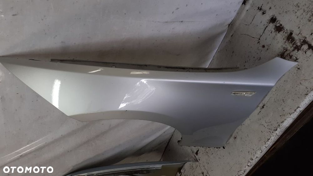 * BŁOTNIK PRZEDNI PRZOD  LEWY BMW 1 E81 E82 E87 E88 TITANSILBER 354 - 2