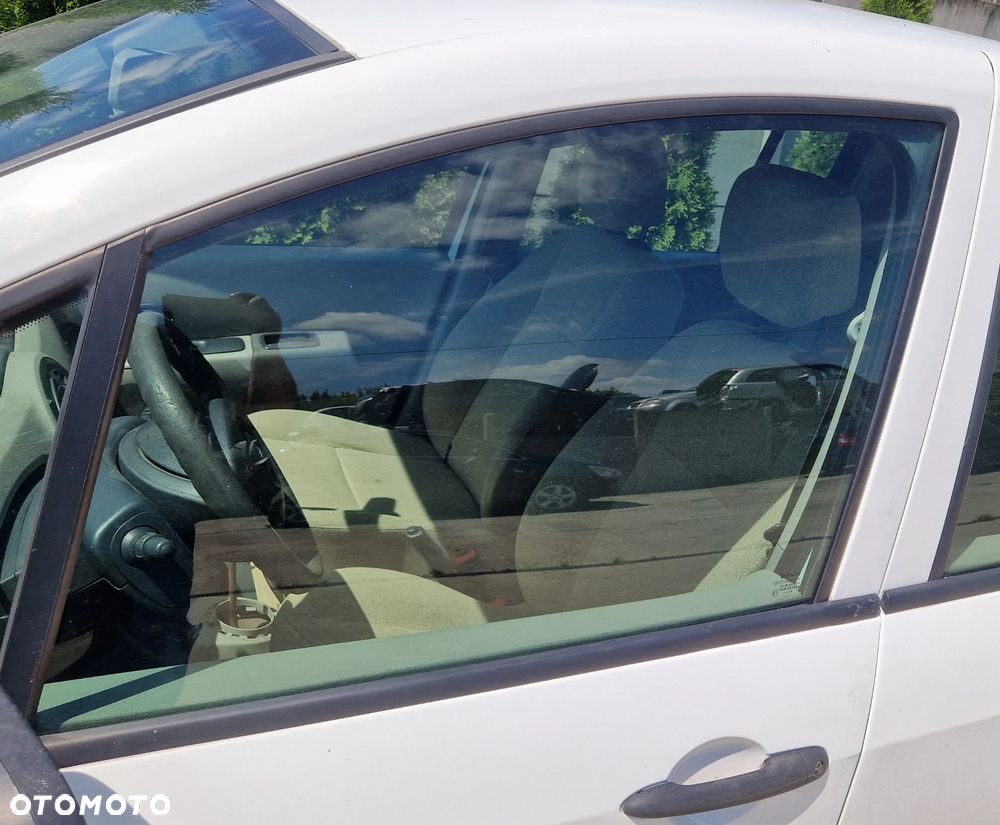 RENAULT MODUS SZYBA DRZWI LEWY PRZÓD - 1