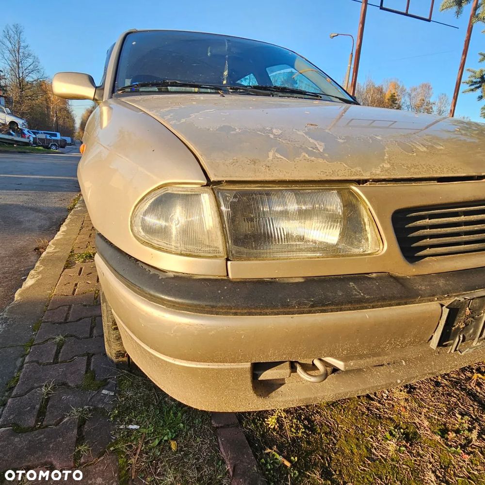 Opel Astra Classic F 1,4 B  (Z489) pojazd na części: maska, zderzak, drzwi, szyby, lusterka, chłodnica - 11