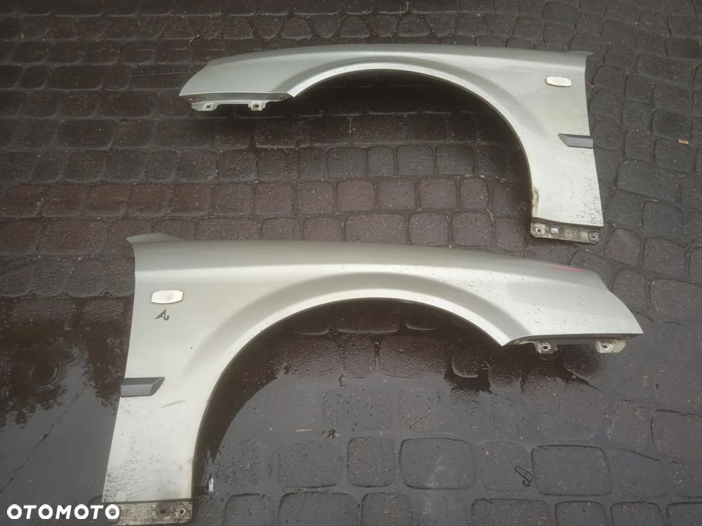 BŁOTNIK CHEVROLET EVANDA 05- PRAWY LUB LEWY - 1