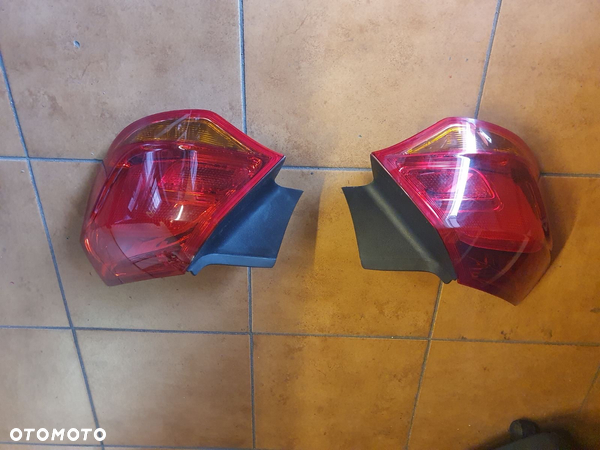 LAMPA L/P TYŁ OPEL ASTRA J