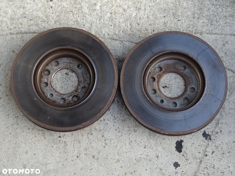 OPEL ZAFIRA B ASTRA H ZACISK PRAWY LEWY PRZÓD JARZMO ZACISKI PRZEDNIE 57/25 280mm - 20