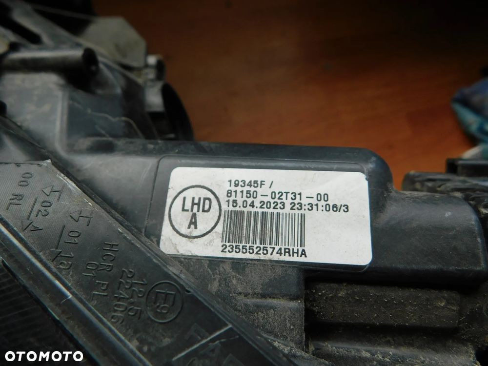 lampa lewa przód TOYOTA COROLLA E21 EU - 12