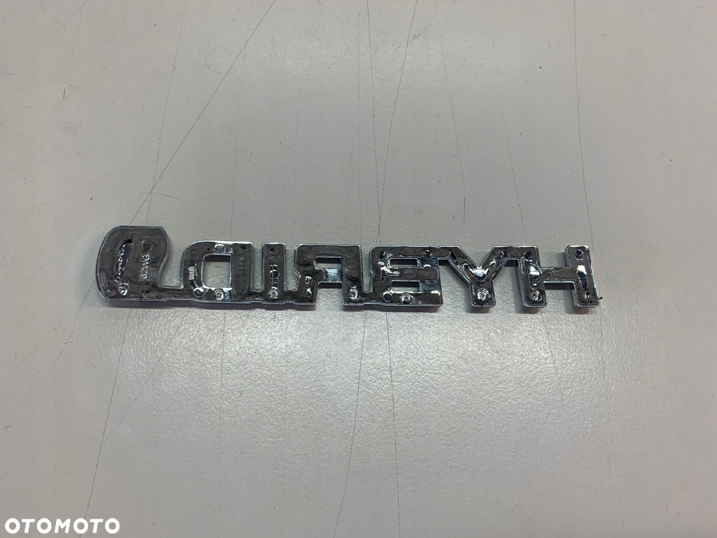 TOYOTA COROLLA E210 18- EMBLEMAT KLAPY TYŁ HYBRID - 2