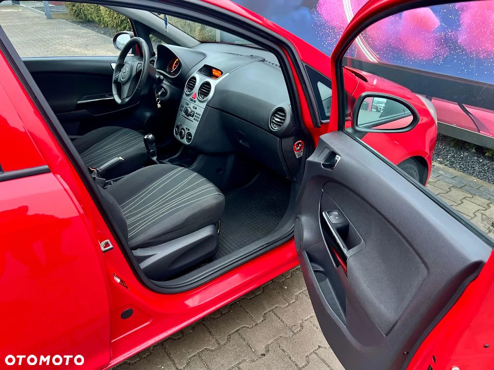 Opel Corsa 1.4 16V Cosmo - 11