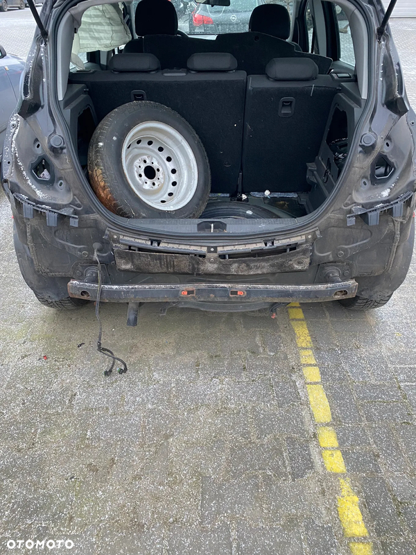 OPEL CORSA D 5 drzwi PAS TYLNY TYŁ