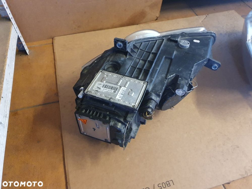 REFLEKTOR L/P VW PASSAT B6 BI XENON - 12