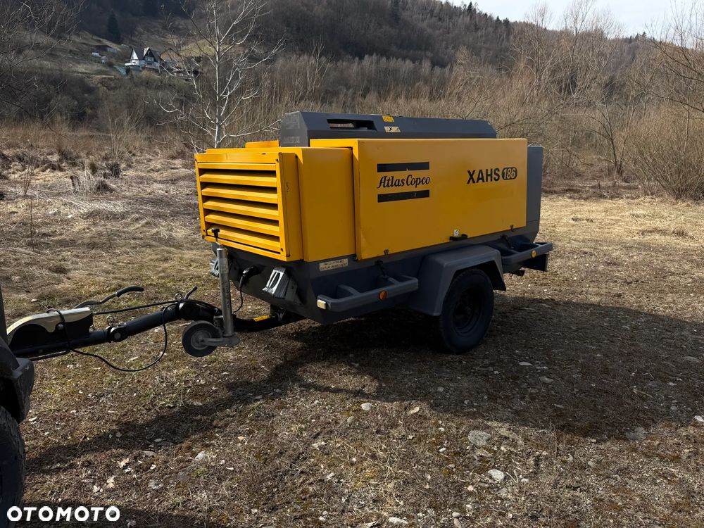 Atlas Copco XAHS 186 Kompresor Śrubowy Sprężarka potężna mocna 11m3. 12 bar regulowanych. Bogata wersja z chłodnicą cyklonową! z Norweskiej Upadłości! Niski Przebieg 1900mtg. 2014rok silnik DEUTZ.150 KM. serwisowany w DEKRA. OKAZJA - 1