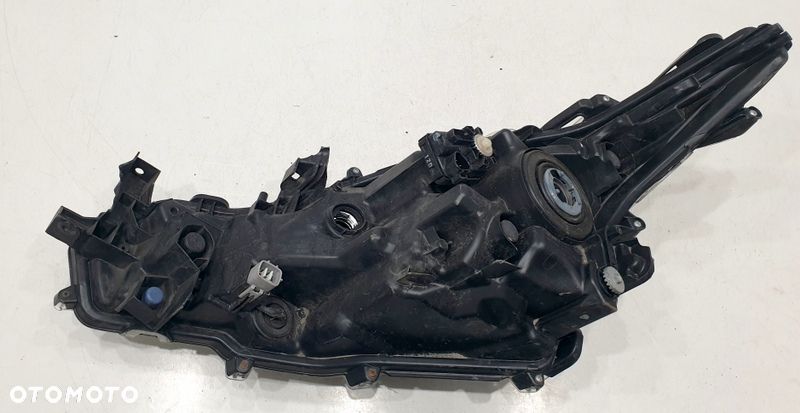 Toyota Corolla E21 Reflektor Prawy 81110-02T31-00 - 2