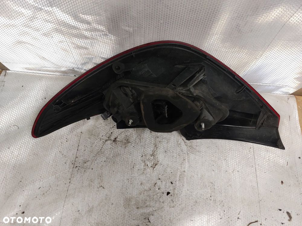 .  LAMPA TYL TYLNA LEWA OPEL CORSA D !5D!!CIEMNA! - 5