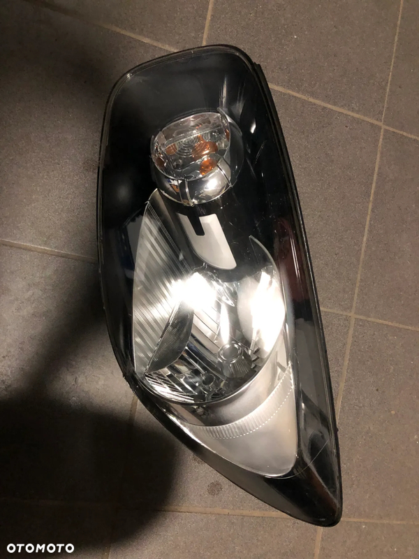 92101-1Y0 reflektor lewy lampa przód uk kia picanto