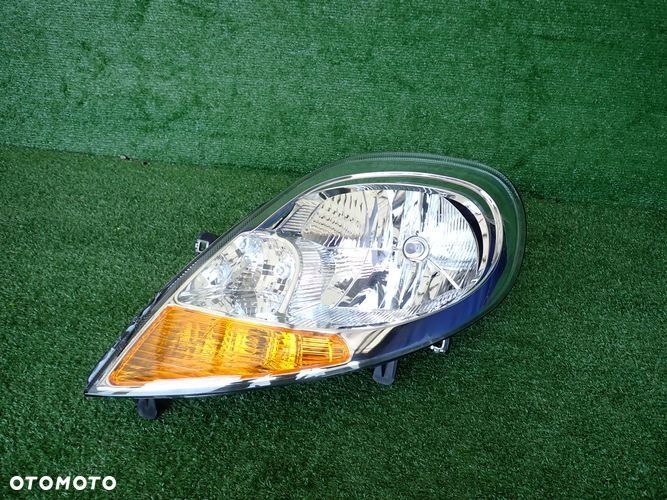 TRAFIC VIVARO II LIFT 06-14 reflektor lewy lampa lewa 8200701352 - 1