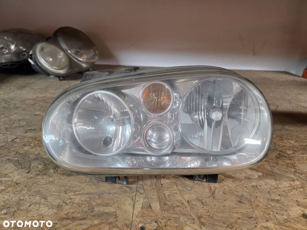 VOLKSWAGEN GOLF IV REFLEKTOR LAMPA LEWA PRZEDNIA ANGLIK  1J2941015A - 1