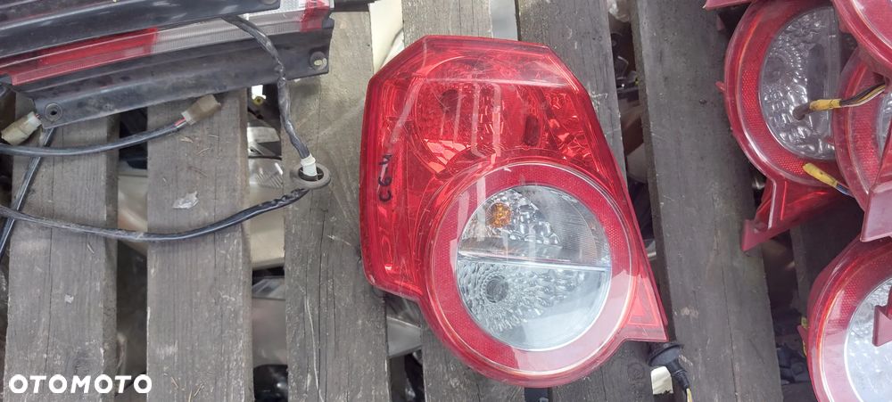 .  TYL TYLNA LAMPA LEWA CHEVROLET AVEO - 1