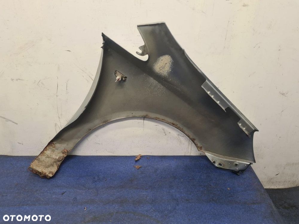 OPEL CORSA D BŁOTNIK PRZÓD LEWY - 6