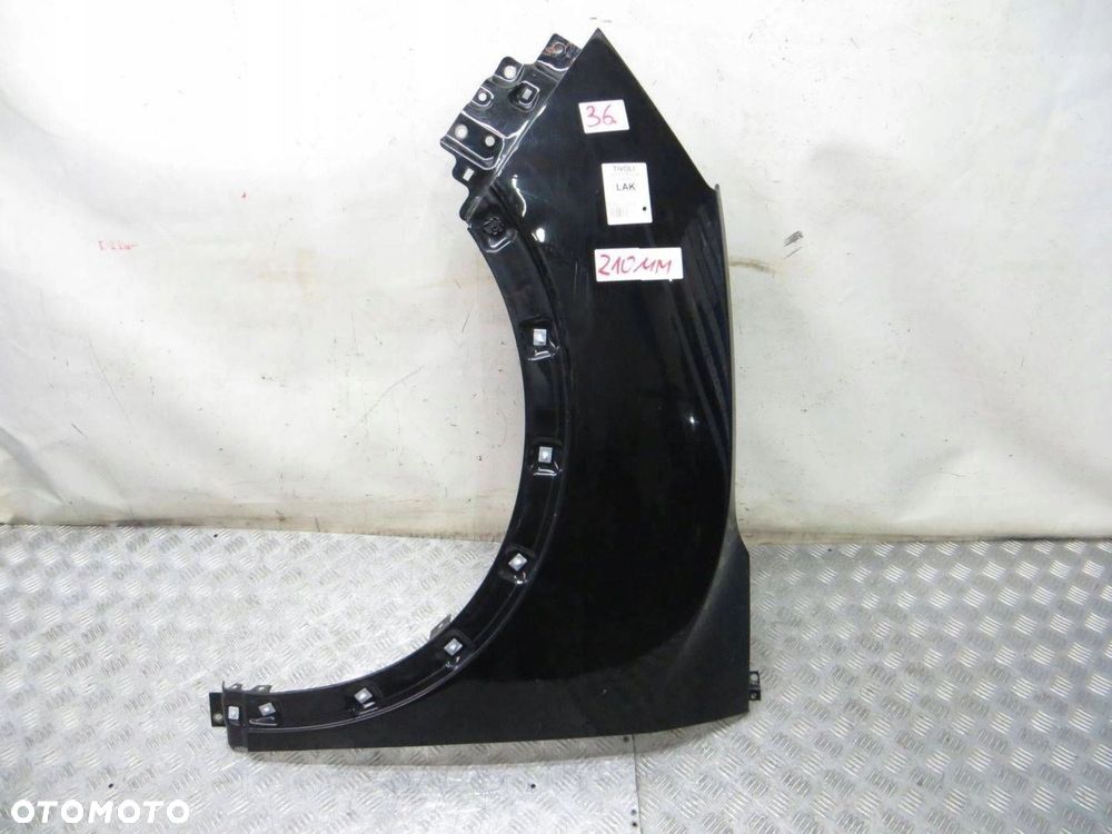 SSANGYONG TIVOLI BŁOTNIK LEWY PRZÓD LAK 14- - 1